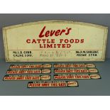 Arched wooden red and cream painted sign board for 'Lever's Cattle Foods Limited', 38" x 15.5";