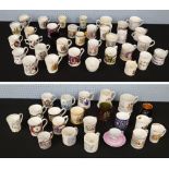 Collection of commemorative cups and mugs