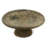 Large and heavy primitive rustic carved footed wooden bowl, 21" diameter, 8" high, 1" thick