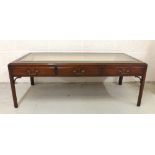 Good quality modern mahogany glazed bijouterie coffee table, the bevelled glazed top over a single