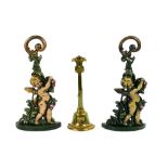 Pair of painted cast iron Victorian style cherub doorstops, 16.5" tall; together with an antique