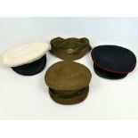 Four Military caps including a WWI Reese & Bonn trench cap with Hampshire Reg badge