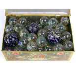 Collection of approximately eighty vintage 1" speckled shooter marbles with three 1.5" speckled blue