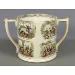 Large 19th century Staffordshire twin handled loving cup, printed with scenes from Mr Pickwick,