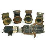 Collection of antique carbide lamps and parts including examples by P & H, Remo, Lucas and H