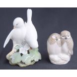 Royal Copenhagen - 'Lovebirds' figural group, factory stamp and inscribed numbered 402 underside,