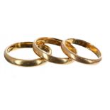 Three 22ct wedding band rings, 11.5gm, ring sizes O, N, K (3)