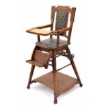 Edwardian oak child's high chair, the foliate carved back with green leather upholstery, supported