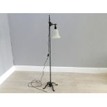 Adjustable cast iron floor lamp with glass shade, 60" tall
