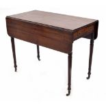 Regency mahogany Pembroke table, the frieze fitted with one drawer and one dummy drawer, supported