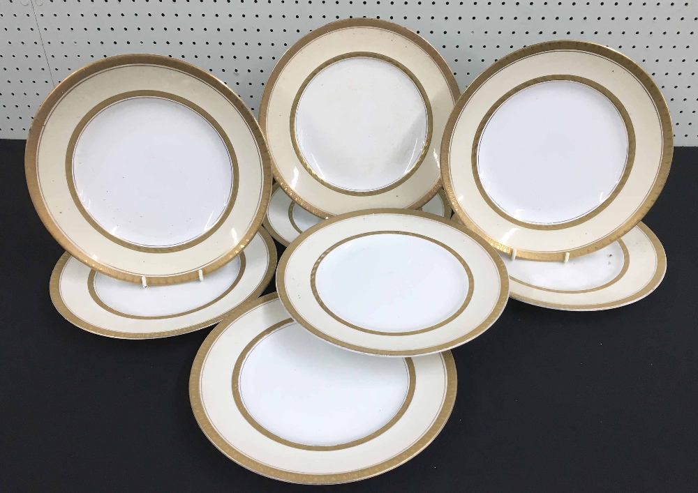 Set of eight Booths for T Goode & Co. china plates, decorated with arching gilt rim borders, 9.5"