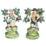 Pair of Staffordshire Walton style bocage figures of gardeners, each entitled Walton to the reverse,