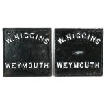 Vintage heavy cast iron black painted plaque with fixing holes and raised lettering 'W Higgins,