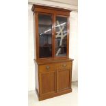 Mahogany glazed bookcase, with double doors over a single drawer and cupboards, 37.5" wide, 84" high