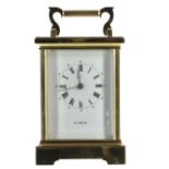 H. Samuel carriage clock striking on a bell, within a corniche style brass case, 7" high (key)