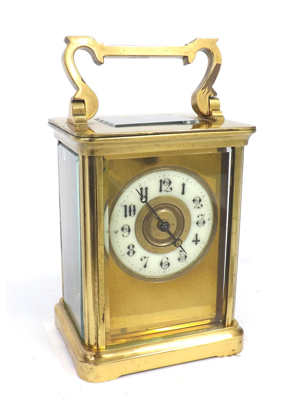Small carriage clock timepiece, the 1.75" cream chapter ring within a gilt mask and corniche brass