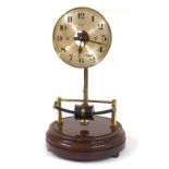 Bulle electric mantel clock, the 5.5" silvered dial with skeletonised centre, upon brass supports