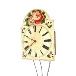 Black Forest shield wall clock, the 10.75" rounded arched dial painted with roses, with other