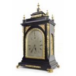 Good English ebonised and gilt metal mounted triple fusee boardroom clock, the 9" silvered arched