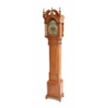 Good oak eight day grandmother clock, the 7" brass arched dial with moon phase over a silvered
