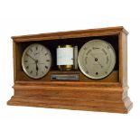 Good large weather station, comprising twin drumhead cased clock and barometer movements with 7"