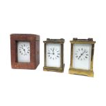 Brass carriage clock timepiece, 5.75" high (key), with outer Morocco travelling case; also two other