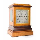 Good English satinwood and rosewood cased double fusee library clock, the 6" square silvered foliate