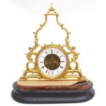 French ormolu skeleton clock, the 4.25" white enamel chapter ring enclosing a skeletonised centre,