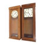 Two C. Theod. Wagner mechanical wall clocks with provision for contacts to operate electrical slaves