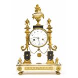 French ormolu and marble two train drumhead mantel clock striking on a bell, the 4" white convex