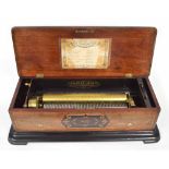 Good rosewood Nicole Freres music box, the 13 1/8" cylinder playing on eight airs, with original