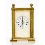 Miniature carriage clock timepiece, the 1" recessed dial within an ivorine case, 3" high