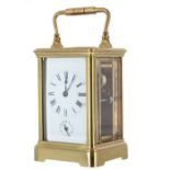 Carriage clock timepiece with alarm striking on a bell, the movement back plate stamped with the