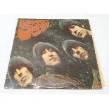 The Beatles - autographed Rubber Soul vinyl record signed 'Ringo' in black pen to the front cover *