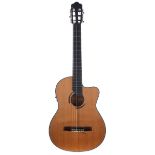 Electro-acoustic classical guitar, unbranded; Back and sides: laminated mahogany; Top: spruce, minor