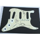 Eagles - guitar scratchplate bearing what appear to be the autograph signatures of Eagles members