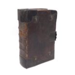 Early interesting large leather and brass bound hardback book containing various musical scores (