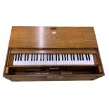 Wooden cased portable piano keyboard inscribed 'The Triumph de Lure, Salvationist Publishing and