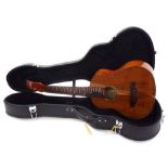 Alulu GUK guitar ukulele, in need of a new set of tuners, within a contemporary hard case