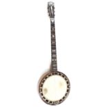 The Cammeyer Vibrante five string banjo, with birds eye maple and walnut cross banded geometric