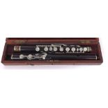 Rosewood flute circa 1850 by and stamped H. Journet, 43 Tottenham Court Road, with block mounted
