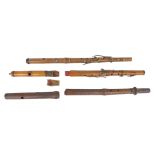 Three old boxwood flutes in need of restoration, one stamped F. Heller, another Hollinger and the