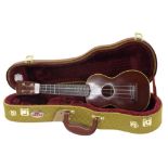 Pre-war C.F. Martin & Co Style 2 soprano ukulele, within a contemporary tweed hard case