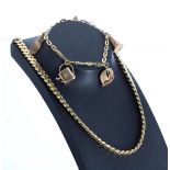 18ct curb necklace, 56.3gm, 15" long; also bracelet with five charms, 8.1gm (2) (306)