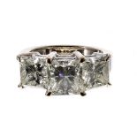 Fine and impressive 18ct white gold princes-cut three stone diamond ring, 2.94ct , 3.24ct, 2.93ct