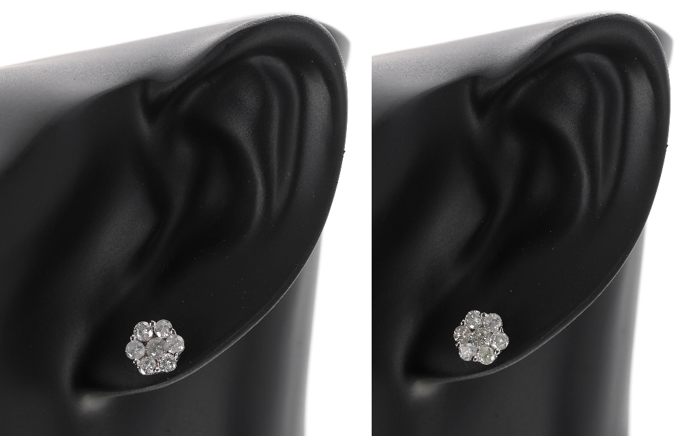 Pair of 9ct white gold seven stone diamond cluster earrings, 1.00ct approx, 1.5gm, 8mm