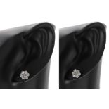 Pair of 9ct white gold seven stone diamond cluster earrings, 1.00ct approx, 1.5gm, 8mm