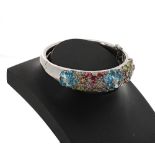 14k white gold multi-coloured gem set hinged bangle, signed Celamoro, width 16mm 36gm (40)