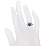 Attractive platinum tanzanite and baguette diamond ring