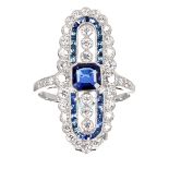 Platinum ornate elongated platinum sapphire and diamond ring